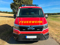 Fahrzeug Ford Transit mit Blaulichtbalken RTK 7, 1.400 mm, blau und Kennleuchte Comet, blau, Frontblitzer BST, seitlich, Produkte beschriftet